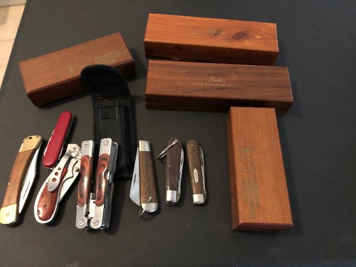 pocket knives and sharpening stones in boxes
