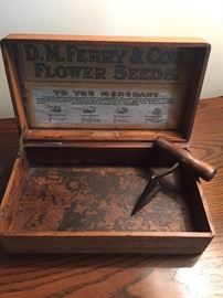 Old seed box with tool