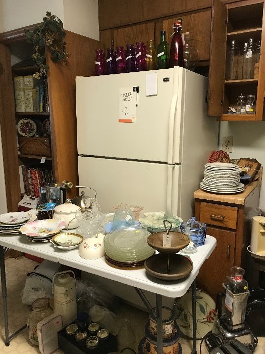 Vintage small appliances including vitamix, snack plates, hand painted china, colored glass bottles, restaurant ware.