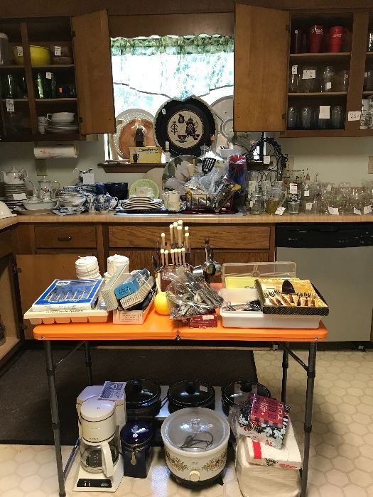 The kitchen is  jam packed with vintage treasures. Everything is priced to sell. You know how at sales there is often a shelf or section of dollar items? We bagged them up and you get a whole bag for $1!