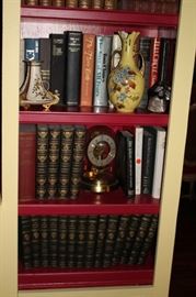 Books and Assorted Decorative Pitchers and Urns with Clock 