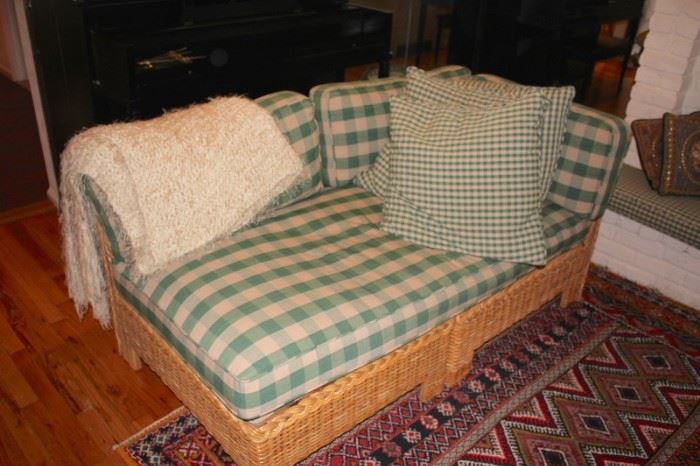 Wicker Lounge with Plaid Green Cushions, Throw and Pillows