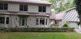 The house (very near to the Lake Michigan shoreline) has 3 levels along with a large garage.