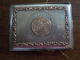 cigarette case with Mayan calendar