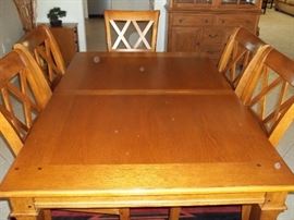 Very Nice Table 6 chairs & leaf spots on lens not table.