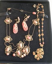 carved coral and coral glass necklaces and earrings