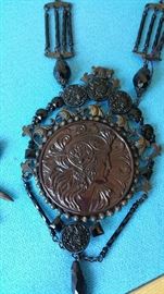 close up of the medallion necklace