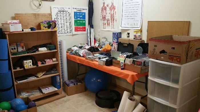 fitness equipment - posters - bookcase - storage drawers
