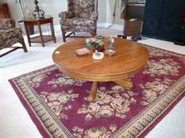 Area rug with oak pedestal coffee table