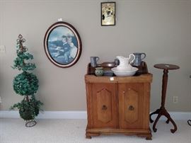 Dry sink, pedestal, framed print and faux plant
