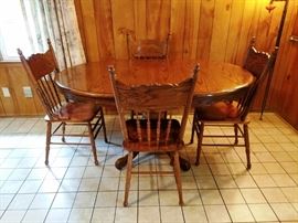Oak Pedestal Dining Table w/Four Chairs: http://www.ctonlineauctions.com/detail.asp?id=740361