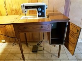 Kenmore Sewing Machine & Sewing Desk: http://www.ctonlineauctions.com/detail.asp?id=740364