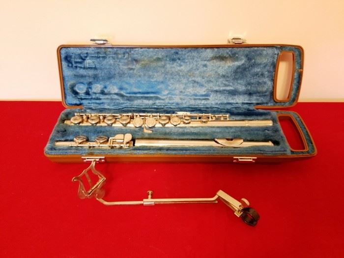 Yamaha Flute, Case & Music Holder:   http://www.ctonlineauctions.com/detail.asp?id=740874