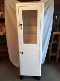Vintage Clinic Steel Cabinet:  http://www.ctonlineauctions.com/detail.asp?id=740928