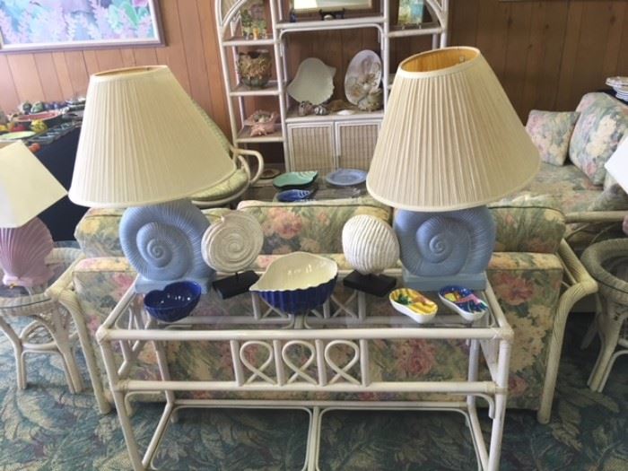 wicker sofa table, blue seashell lamps, nautical décor