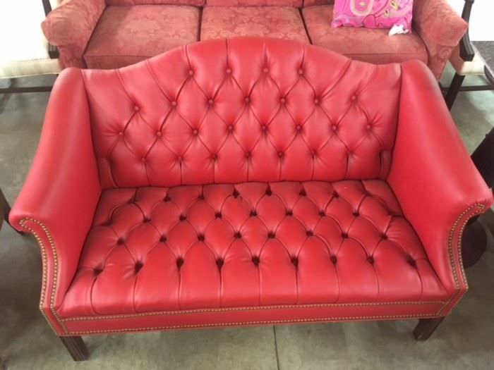 beautifully upholstered red sofa 