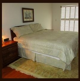 Plush Bed, One of a Pair of Matching Nightstands, part of the Bedroom Suite  