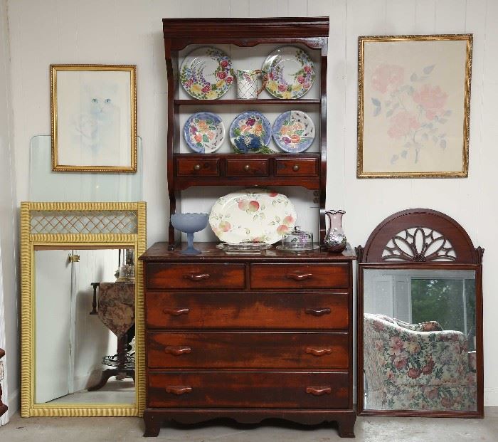 Two part hutch flanked by decorator mirrors.