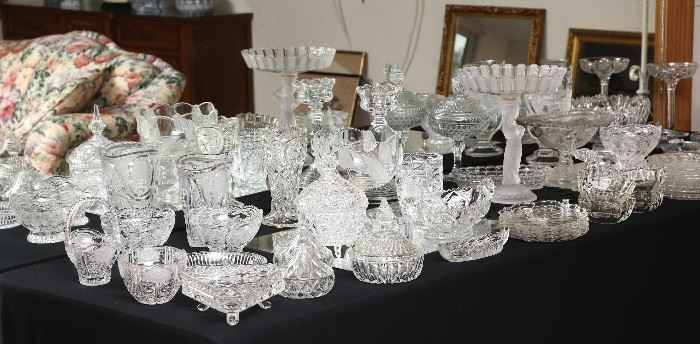 Large collection of pressed and cut glass.