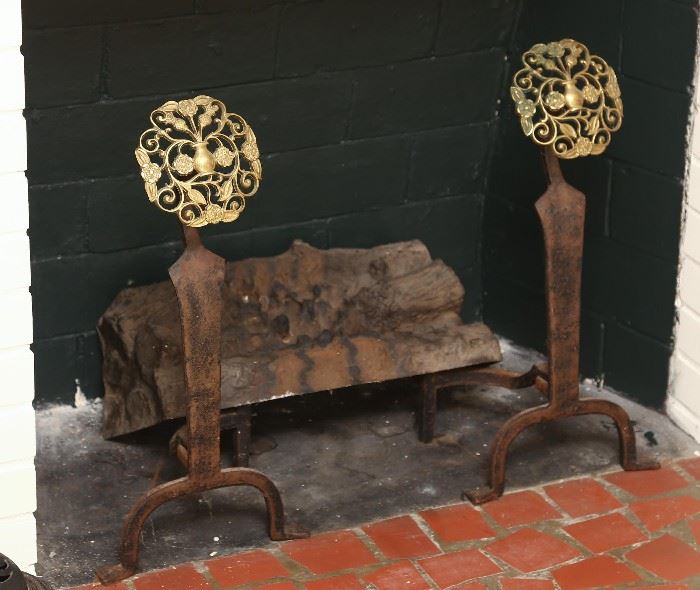 Wonderful andirons with fancy brass tops.