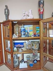 One of three wall cases of knick-knacks