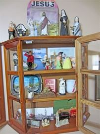 One of three wall cases of knick-knacks