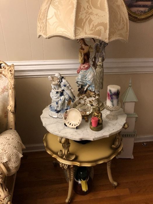 Vintage Italian Marble top table (there is a pair).  Italian Lamp with Parasol Lamp shade.  Lamp has a companion