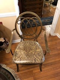 Bronze color kitchen table with glass.  Has 4 chairs