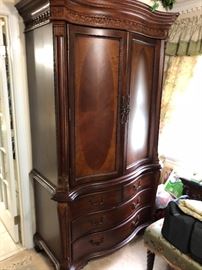 Large bedroom armoire with shelving inside doors