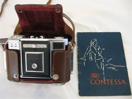 Zeiss Ikon camera with leather case and manual