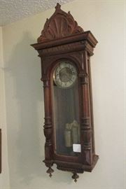 antique regulator clock with etched brass pendulum and weights
