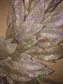 *NEW WITH TAGS* BEAUTIFUL GOLD AND SILVER GLITTER YEAR-ROUND WREATH: Barney's. Diameter is 22" from widest leaf. Excellent, new condition.