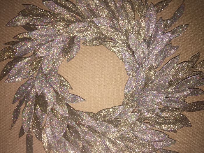 *NEW WITH TAGS* BEAUTIFUL GOLD AND SILVER GLITTER YEAR-ROUND WREATH: Barney's. Diameter is 22" from widest leaf. Excellent, new condition.