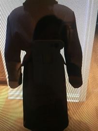 LADIES BEAUTIFUL LONG ITALIAN WOOL COAT WITH FUR COLLAR, FROM SAKS FIFTH AVENUE: Dark Navy wrap coat with belt. No buttons. Approximate measurements: Shoulder to shoulder: 20". Sleeve: 23.5". Waist: 50". Length: 50". Lightweight but warm coat. Wear 3 seasons. Light overall wear. In good condition. Prepare for fall/winter now with this incredible coat! $225.00.