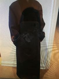LADIES BEAUTIFUL LONG ITALIAN WOOL COAT WITH FUR COLLAR, FROM SAKS FIFTH AVENUE: Dark Navy wrap coat with belt. No buttons. Approximate measurements: Shoulder to shoulder: 20". Sleeve: 23.5". Waist: 50". Length: 50". Lightweight but warm coat. Wear 3 seasons. Light overall wear. In good condition. Prepare for fall/winter now with this incredible coat! $225.00.
