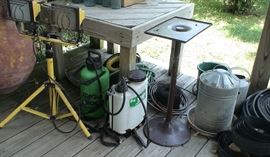 Bug sprayers, shop light, bird cage stand