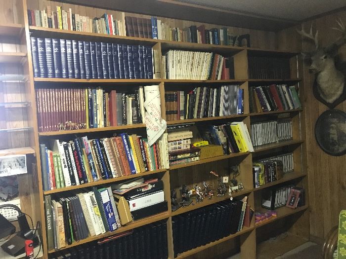 Huge book collection in den, bedrooms, hobby room