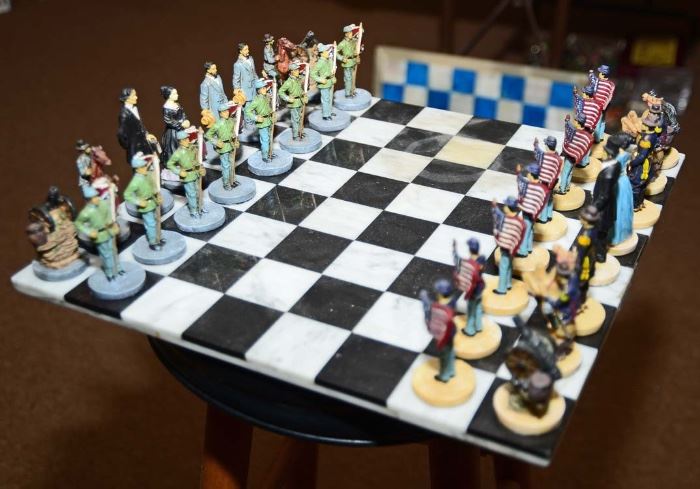 One of half a dozen chess sets, marble chessboard
