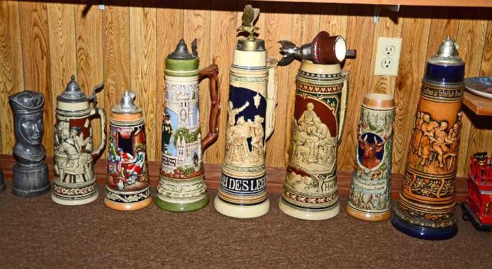 More than 60 beer steins from various locations