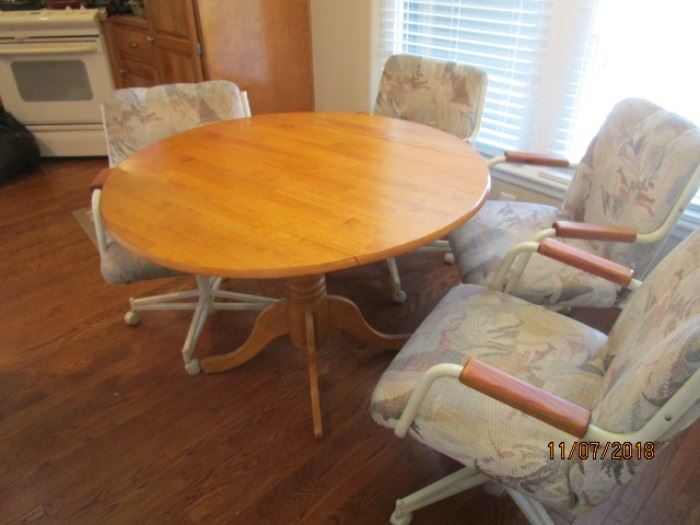 drop leaf pedestal table with 4 chairs