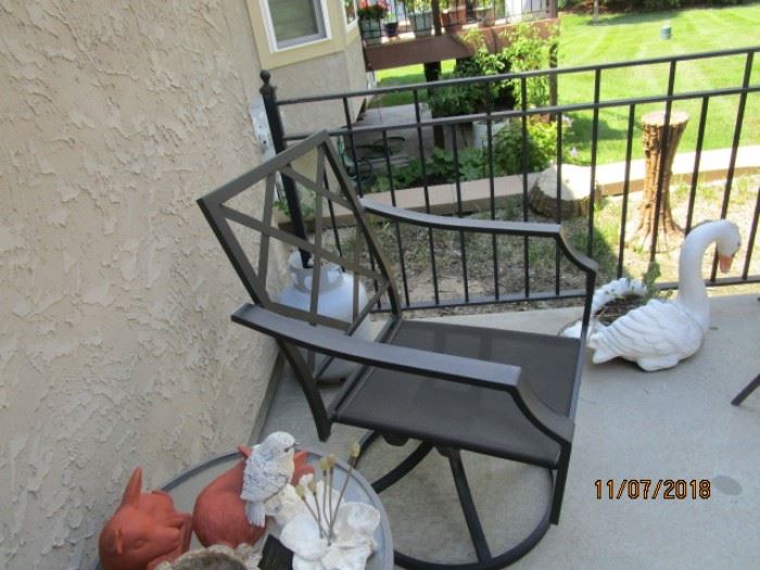 one of two matching patio chairs