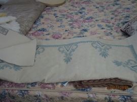 Blue and white hand-stitched wool rug made in India