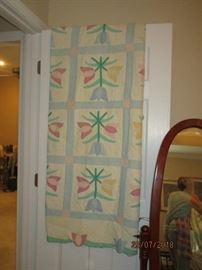 Hand-stitched and appliqued quilt