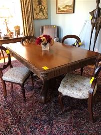 Hand Carved Dining Room Pedestal Table, Comfortably Seats Four or Six, Set of Four Dining Chairs
