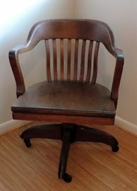 ANTIQUE WOODEN ROLLING OFFICE ARMCHAIR