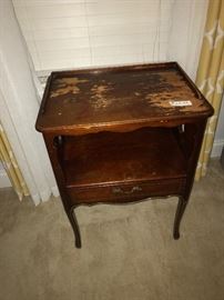 Cherry wood telephone table. From the 50’s some water damage. Great wood for referb project. $45