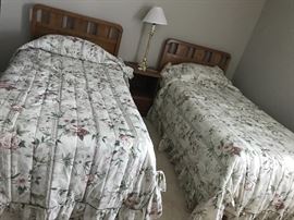 Two twin foam gel mattresses with headboards and frames. Each with headboard and frame $150 and night stand $25. If buy all as set $300