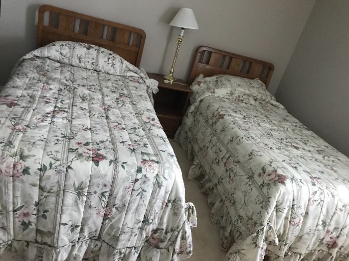 Two twin foam gel mattresses with headboards and frames. Each with headboard and frame $150 and night stand $25. If buy all as set $300