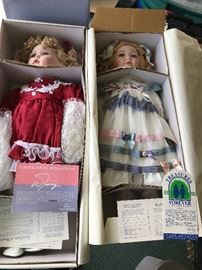 Micaela and Gail dolls with certificates and numbers.