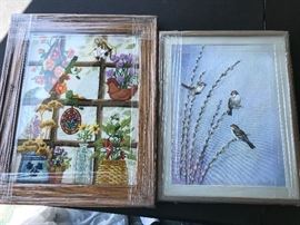 Handmade needle point art with frames.